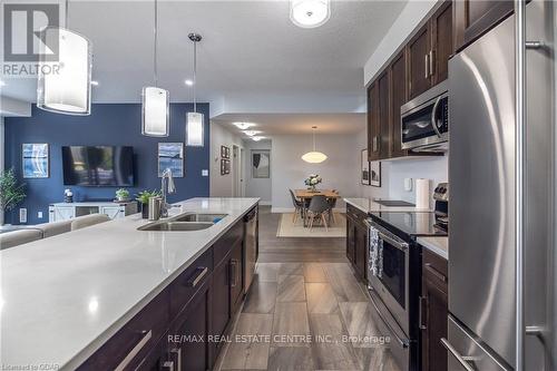 17 - 32 Arkell Road, Guelph, ON - Indoor Photo Showing Kitchen With Stainless Steel Kitchen With Double Sink With Upgraded Kitchen