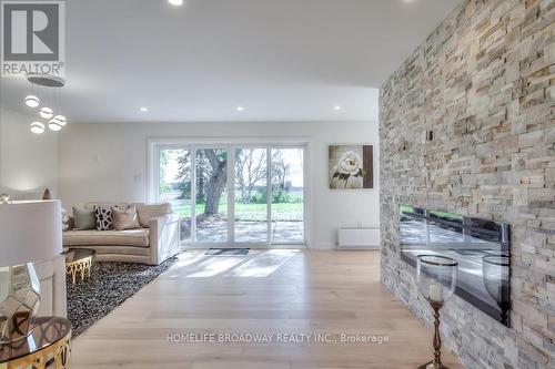 5875 19Th Avenue, Markham, ON - Indoor Photo Showing Living Room With Fireplace