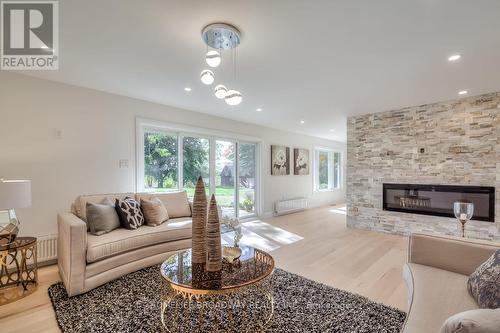 5875 19Th Avenue, Markham, ON - Indoor Photo Showing Living Room With Fireplace