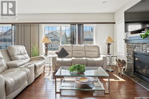 571 Maguire Lane, Saskatoon, SK - Indoor Photo Showing Living Room With Fireplace