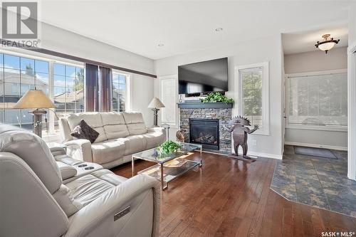 571 Maguire Lane, Saskatoon, SK - Indoor Photo Showing Living Room With Fireplace