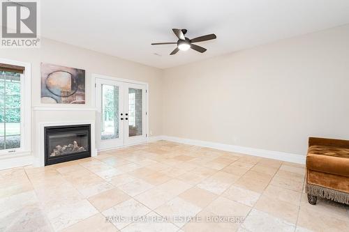 14 Lloyd Cook Drive W, Springwater (Minesing), ON - Indoor Photo Showing Living Room With Fireplace