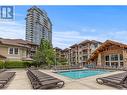 1093 Sunset Drive Unit# 310, Kelowna, BC  - Outdoor With In Ground Pool With Facade 