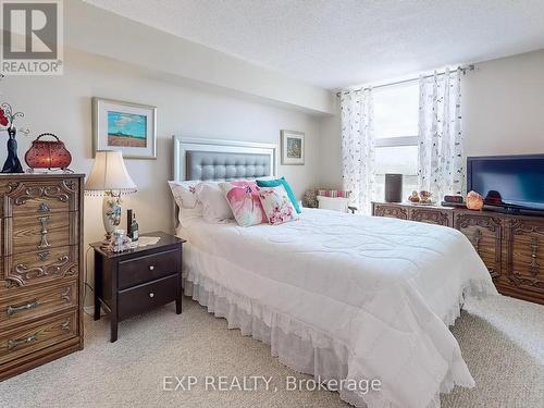 718 - 10 Dean Park Road, Toronto (Rouge), ON - Indoor Photo Showing Bedroom