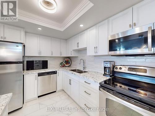 718 - 10 Dean Park Road, Toronto (Rouge), ON - Indoor Photo Showing Kitchen With Double Sink