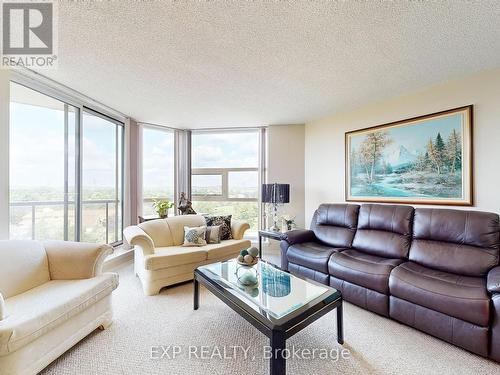 718 - 10 Dean Park Road, Toronto (Rouge), ON - Indoor Photo Showing Living Room