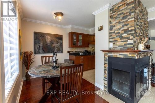 3065 Uplands Drive, Ottawa, ON - Indoor Photo Showing Dining Room With Fireplace