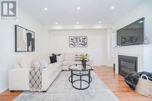 20 Hickling Lane, Ajax (Northwest Ajax), ON - Indoor Photo Showing Living Room With Fireplace