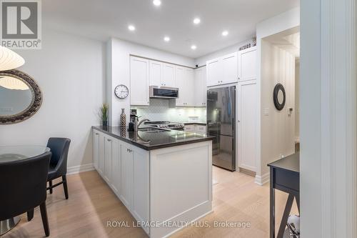 212 - 2855 Bloor Street W, Toronto (Stonegate-Queensway), ON - Indoor Photo Showing Kitchen With Upgraded Kitchen