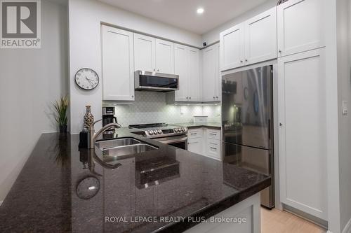 212 - 2855 Bloor Street W, Toronto (Stonegate-Queensway), ON - Indoor Photo Showing Kitchen With Stainless Steel Kitchen With Double Sink With Upgraded Kitchen