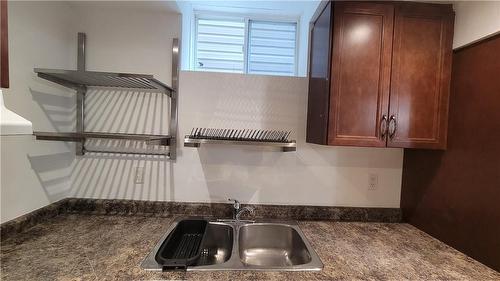 20 Queensdale Avenue W|Unit #Bsmt, Hamilton, ON - Indoor Photo Showing Kitchen With Double Sink