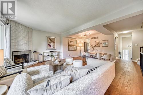 83 Flaming Rose Way, Toronto, ON - Indoor Photo Showing Living Room With Fireplace