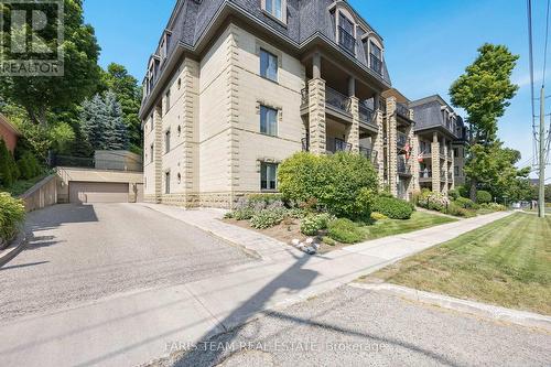 401 - 200 Collier Street, Barrie, ON - Outdoor With Facade