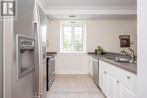 401 - 200 Collier Street, Barrie (Codrington), ON - Indoor Photo Showing Kitchen With Double Sink