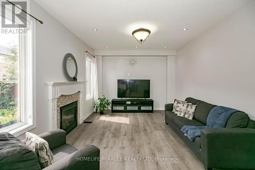 482 Van Kirk Drive, Brampton, ON - Indoor Photo Showing Living Room With Fireplace