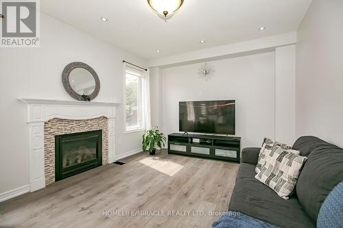 482 Van Kirk Drive, Brampton (Northwest Sandalwood Parkway), ON - Indoor Photo Showing Living Room With Fireplace