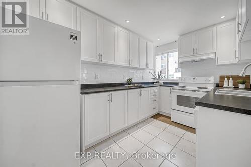 208 - 1055 Dundas Street E, Mississauga (Applewood), ON - Indoor Photo Showing Kitchen