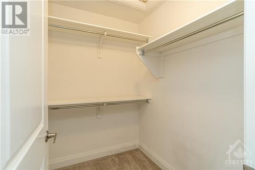 Primary Bedroom Closet - 60 Heirloom Street, Ottawa, ON - Indoor With Storage