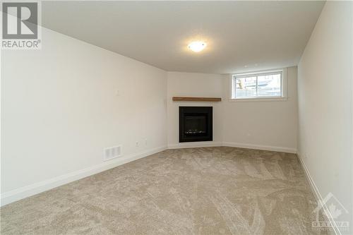 Basement - 60 Heirloom Street, Ottawa, ON - Indoor With Fireplace