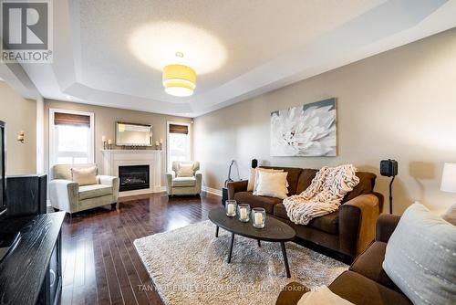 73 Baxter Street, Clarington (Bowmanville), ON - Indoor Photo Showing Living Room With Fireplace