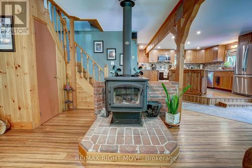 4410 Canal Road, Severn, ON - Indoor Photo Showing Living Room With Fireplace