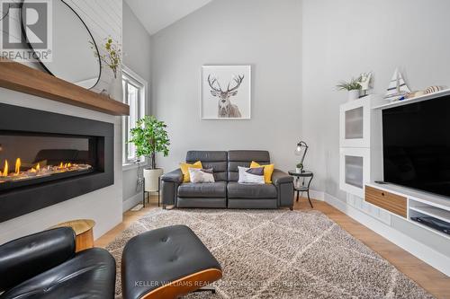 61 Sandy Coast Crescent, Wasaga Beach, ON - Indoor Photo Showing Living Room With Fireplace