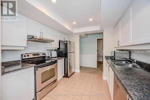 406 - 55 Kingsbridge Garden Circle, Mississauga (Hurontario), ON - Indoor Photo Showing Kitchen With Double Sink