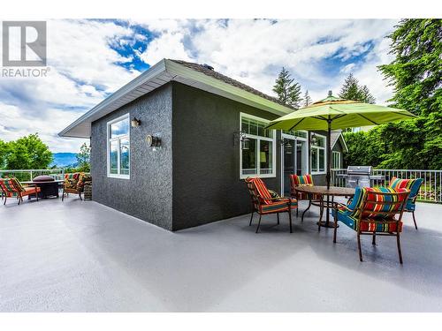 Rear deck overlooking park-like rear yard - 1831 Horizon Drive, West Kelowna, BC - Outdoor With Deck Patio Veranda