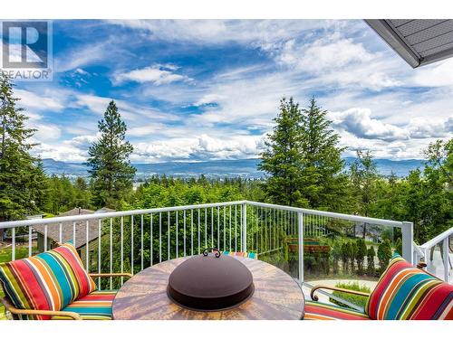 Lake and valley views from the main floor deck. - 1831 Horizon Drive, West Kelowna, BC - Outdoor With View