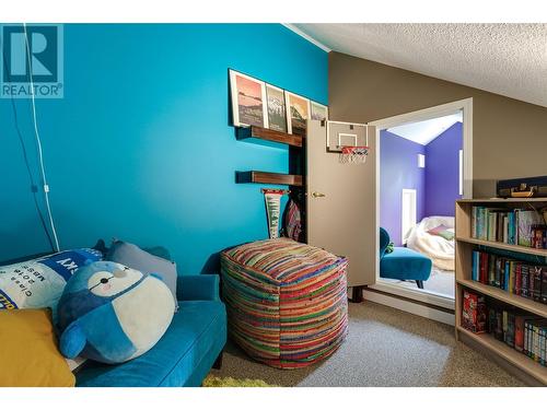 Loft off of one of the bedrooms with door to loft in other bedroom - 1831 Horizon Drive, West Kelowna, BC - Indoor Photo Showing Bedroom