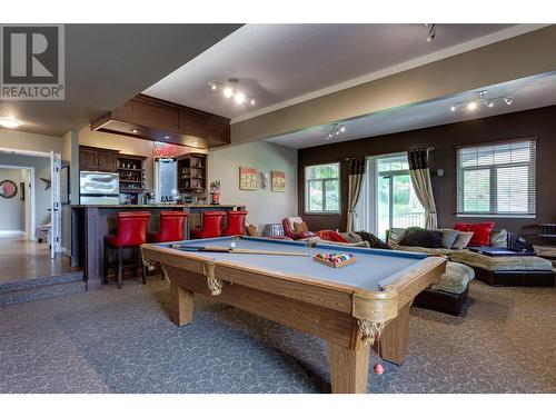 Games room area with a gas fire place - 1831 Horizon Drive, West Kelowna, BC - Indoor Photo Showing Other Room