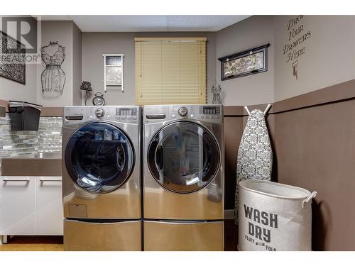 laundry on lower floor - 1831 Horizon Drive, West Kelowna, BC - Indoor Photo Showing Laundry Room