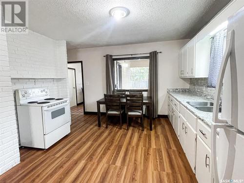 414 6Th Street W, Meadow Lake, SK - Indoor Photo Showing Kitchen With Double Sink