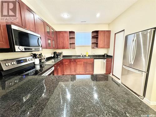 7 211 20Th Street W, Prince Albert, SK - Indoor Photo Showing Kitchen With Stainless Steel Kitchen