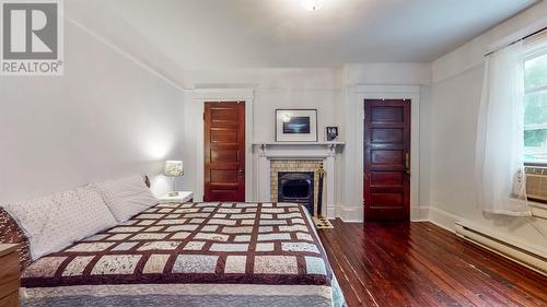 100 Hamilton Avenue, St.John’S, NL - Indoor Photo Showing Bedroom With Fireplace