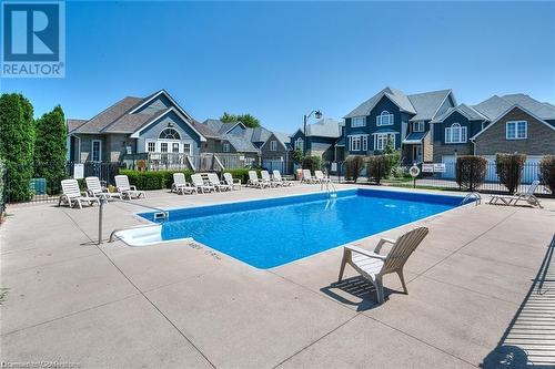 199 Saginaw Parkway Unit# 11, Cambridge, ON - Outdoor With In Ground Pool