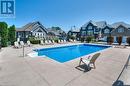 199 Saginaw Parkway Unit# 11, Cambridge, ON  - Outdoor With In Ground Pool 