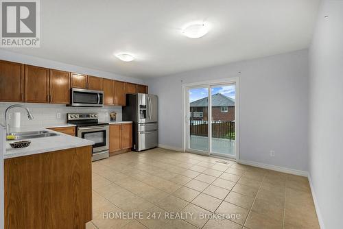 1147 Clover Avenue, Windsor, ON - Indoor Photo Showing Kitchen With Double Sink