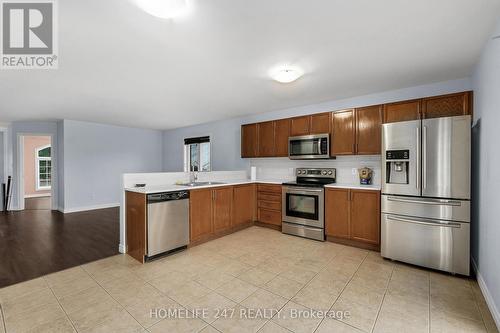 1147 Clover Avenue, Windsor, ON - Indoor Photo Showing Kitchen With Double Sink