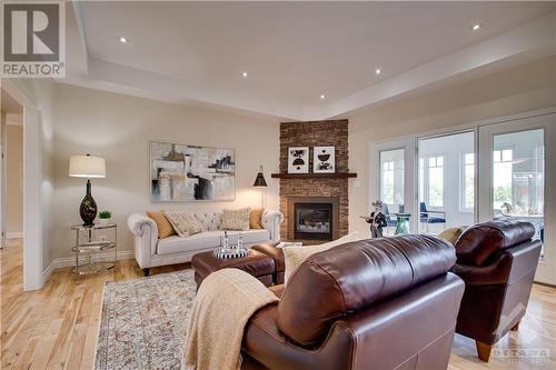 99 Muirfield Court, Ottawa, ON - Indoor Photo Showing Living Room With Fireplace