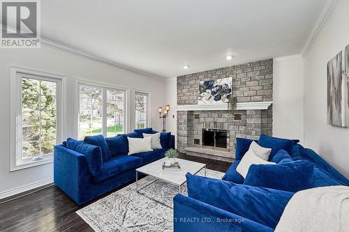 #7 - 25 Manor Park Crescent, Guelph (Old University), ON - Indoor Photo Showing Living Room With Fireplace