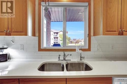 207 4451 Nicurity Drive, Regina, SK - Indoor Photo Showing Kitchen With Double Sink