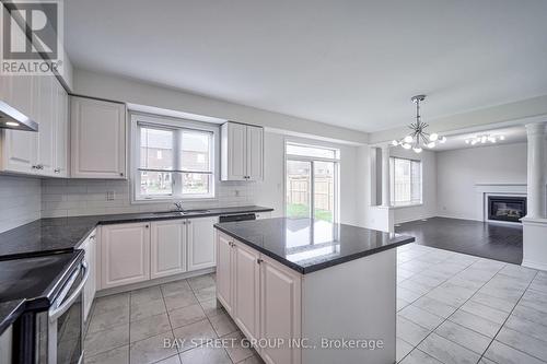 10 Rugman Crescent, Springwater (Minesing), ON - Indoor Photo Showing Kitchen With Fireplace With Upgraded Kitchen