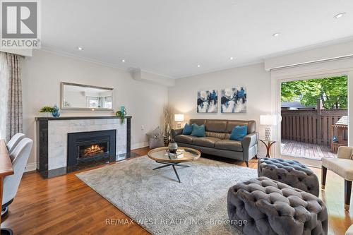 4 Markhall Avenue, Toronto (Islington-City Centre West), ON - Indoor Photo Showing Living Room With Fireplace