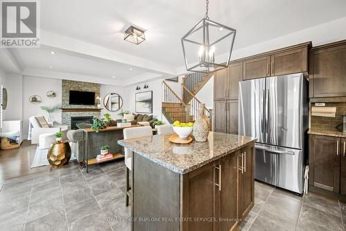 20 Blackburn Lane, Hamilton, ON - Indoor Photo Showing Kitchen With Fireplace With Upgraded Kitchen