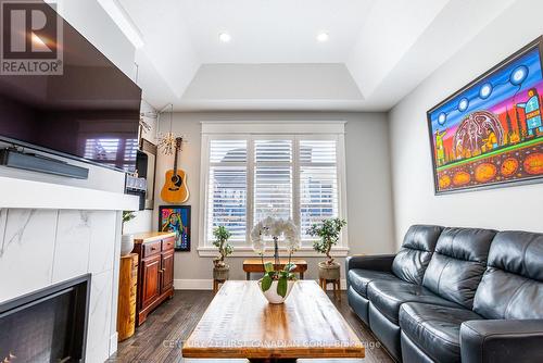 7 Sunrise Lane, Lambton Shores (Grand Bend), ON - Indoor Photo Showing Living Room With Fireplace