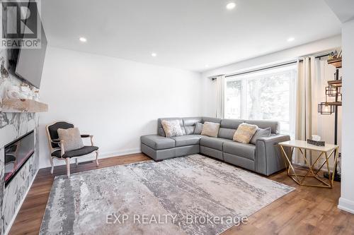 1040 Cedarwood Place, Burlington, ON - Indoor Photo Showing Living Room With Fireplace