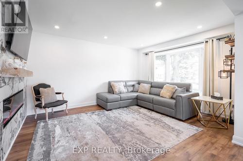 1040 Cedarwood Place, Burlington (Lasalle), ON - Indoor Photo Showing Living Room With Fireplace