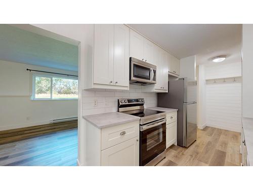 103 - 606 18Th Avenue N, Cranbrook, BC - Indoor Photo Showing Kitchen With Stainless Steel Kitchen