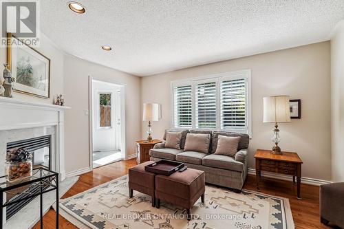 92 - 5480 Glen Erin Drive, Mississauga, ON - Indoor Photo Showing Living Room With Fireplace